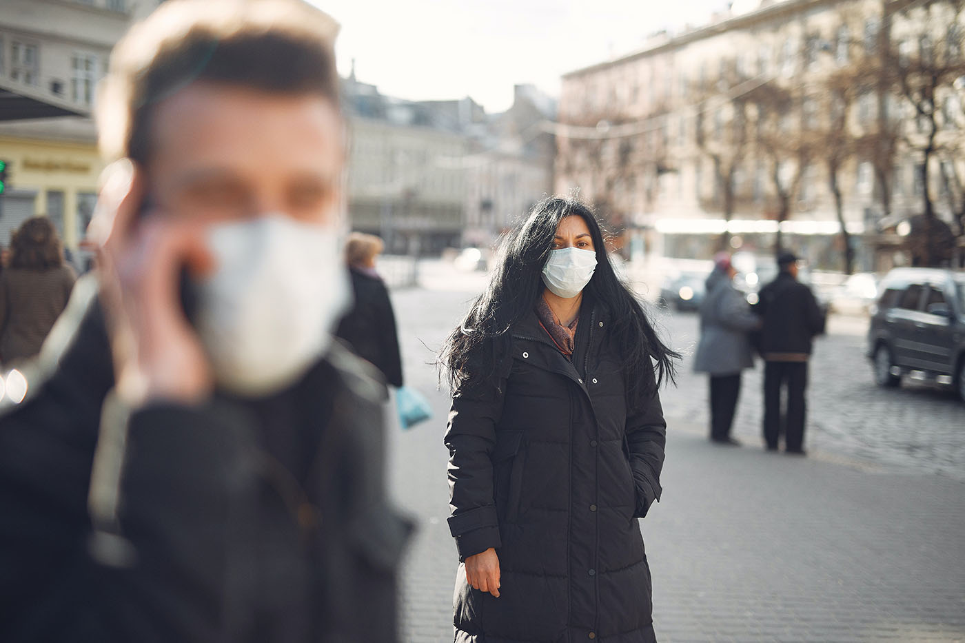 woman-in-black-coat-and-face-standing-on-street-3983428-resized