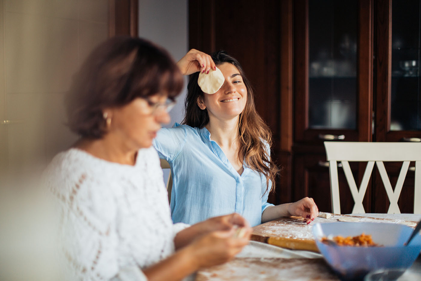 woman-in-blue-top-holding-a-dough-3893705-Resized